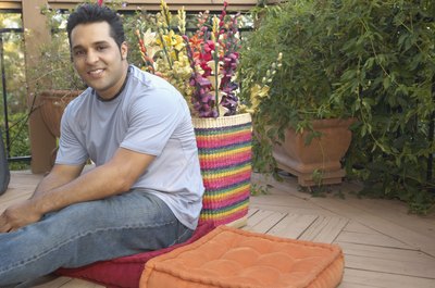 Jack Hollingsworth/Photodisc/Getty Images Re-cover your cushions for a new look.