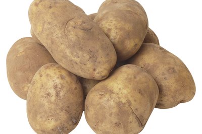Hemera Technologies/PhotoObjects.net/Getty Images Potatoes provide a number of vitamins and minerals.