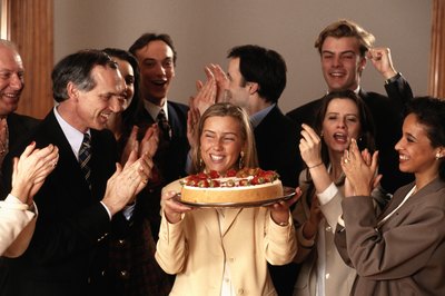 David De Lossy/Photodisc/Getty Images New reasons to celebrate boost spirits at the office.