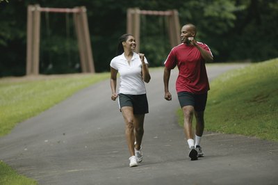 Comstock/Comstock/Getty Images Walking is one of the most popular and effective weight-bearing exercises.
