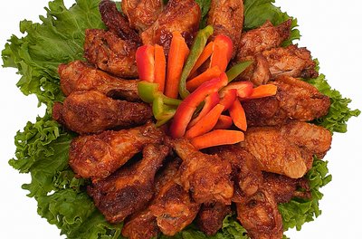 Zedcor Wholly Owned/PhotoObjects.net/Getty Images Chicken wings contain small amounts of cholesterol.