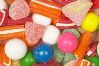Photos.com/AbleStock.com/Getty Images A diet high in sugar can contribute to high triglyceride levels.