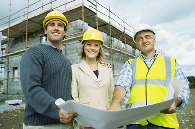 George Doyle/Stockbyte/Getty Images Workplace friends are just one example of social support.
