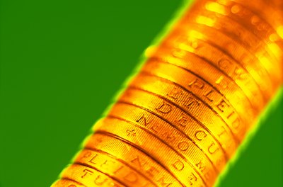 Jupiterimages/Creatas/Getty Images Gold coins aren't currency: they're collectibles and you're taxed accordingly.