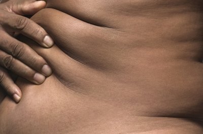 Siri Stafford/Lifesize/Getty Images Reducing lower stomach fat is essential for good health.