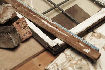 Thomas Northcut/Photodisc/Getty Images Salvaged building materials such as doors and windows offer new use possibilities outside landfills.