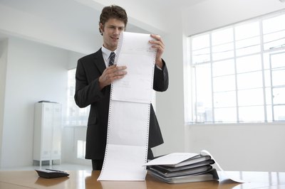 Pixland/Pixland/Getty Images Rental property mortgages require more paperwork and calculations than mortgages for homes.