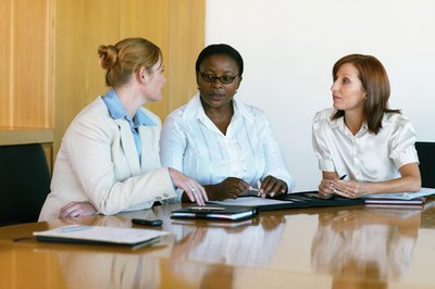 Nick White/Photodisc/Getty Images Ask for your union rep to join you in a employee-supervisor meeting.
