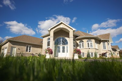 Jupiterimages/Photos.com/Getty Images If your house is in demand, you can raise the asking price as long as you haven't made any binding agreements with a buyer.