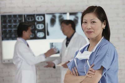 Comstock/Comstock/Getty Images X-ray technicians are trained to direct radiation waves.