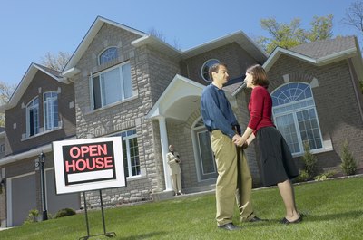 Hemera Technologies/AbleStock.com/Getty Images Rental properties offer the potential for regular income.