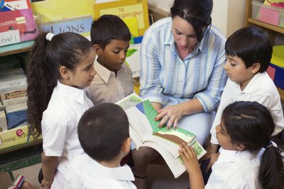 Creatas/Creatas/Getty Images Participating in classroom activities is a common role for effective principals.