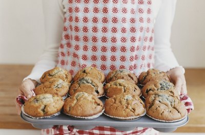 Digital Vision./Digital Vision/Getty Images Sneak protein powder into your day with a mid-morning muffin.