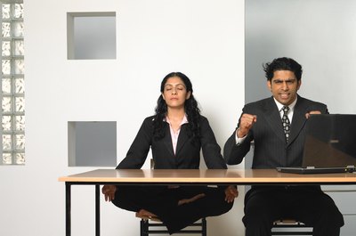 Visage/Stockbyte/Getty Images Acceptance of co-worker's quirks is essential.