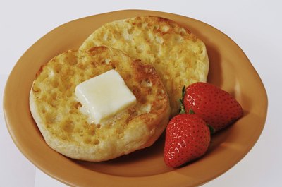 Jupiterimages/Comstock/Getty Images Boost the nutrition of English muffins with protein, dairy, fruit and vegetable toppings.
