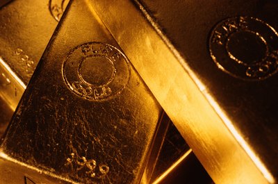 Jupiterimages/Photos.com/Getty Images Pure gold bars may provide a hedge against inflation.