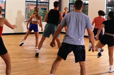 Ryan McVay/Photodisc/Getty Images Mixing up your workouts reduces the adaptation that causes plateaus.