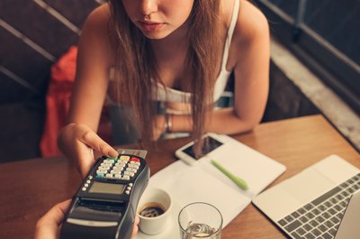 Can a Restaurant Owner Charge a Waitress Credit Card Fees?