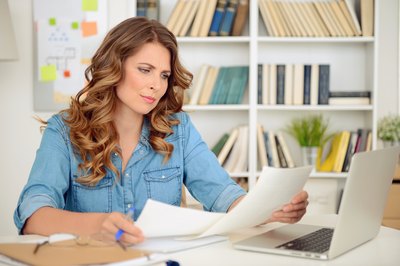 What Do I Enclose With a Form 1040X?