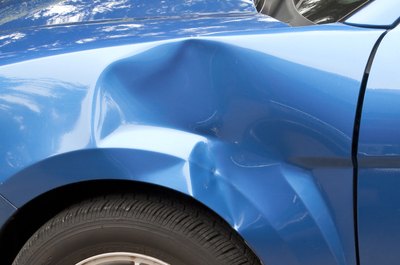 Does Full-Coverage Car Insurance Pay for Dents & Scratches?