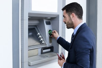 Do You Get Charged for Taking Money Out of a Credit Card?