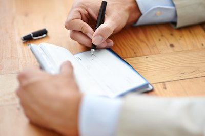What Is the Proper Way to Make Out a Check to a Newly Married Couple?