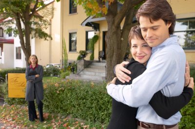 Hemera Technologies/AbleStock.com/Getty Images FHA can help you get a mortgage loan with a low credit score.