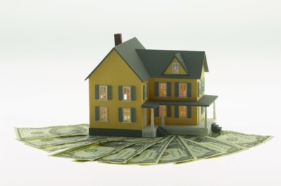Hemera Technologies/Photos.com/Getty Images Find out your debt-to-income ratio before you buy a home.