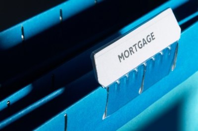 Hemera Technologies/Photos.com/Getty Images Subordinate mortgages are those recorded after other loans on your deed.