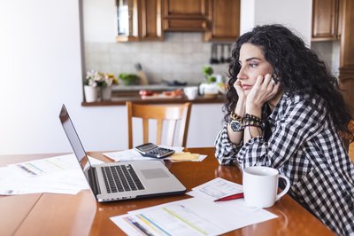 If I Cancel a Debit Card, Will Automatic Bills Still Be Paid With the Old Card Number?