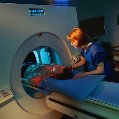 Stockbyte/Stockbyte/Getty Images Radiologists must understand scanning procedures and supervise radiologic technologists in their work.