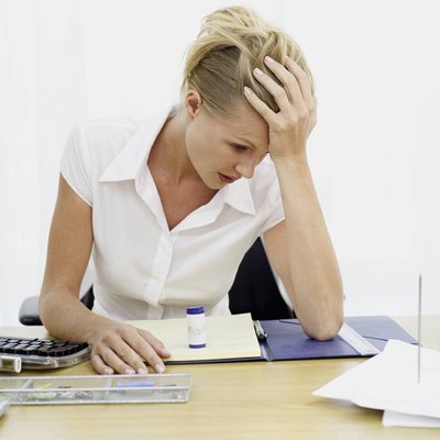 Stockbyte/Stockbyte/Getty Images Bullying can make the workplace a miserable environment.