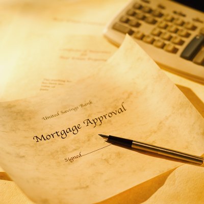 Stockbyte/Stockbyte/Getty Images This can be the final step in revising your mortgage.