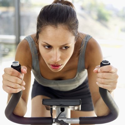 Stockbyte/Stockbyte/Getty Images Your heart rate determines your spinning workout intensity.