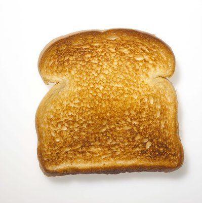 Jupiterimages/Comstock/Getty Images Mild-tasting, low-fat foods and ginger can help reduce nausea.
