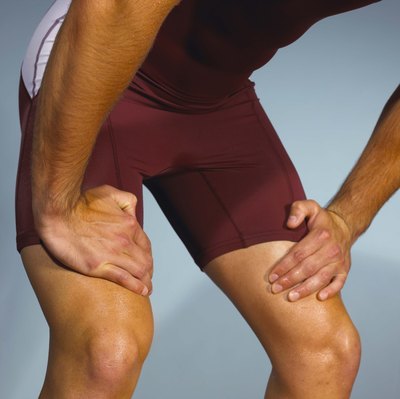 Jupiterimages/Comstock/Getty Images Support painful knees by wrapping them.