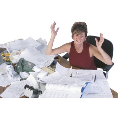 Ablestock.com/AbleStock.com/Getty Images Being unorganized and behind on deadlines is a weakness that effects job performance.