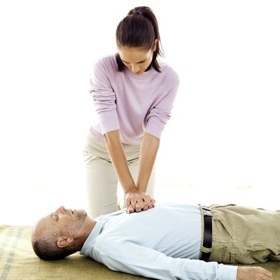Stockbyte/Stockbyte/Getty Images Workers trained in CPR help save lives.