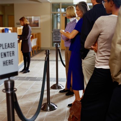 Ryan McVay/Photodisc/Getty Images Savvy investors can cash in on gains in bank stocks.