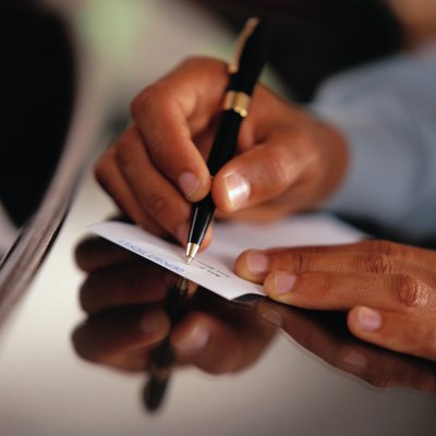 Keith Brofsky/Photodisc/Getty Images A wire transfer is a common method of transferring funds between a buyer's bank account and that of a seller.