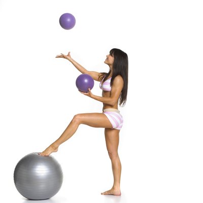 Jupiterimages/Brand X Pictures/Getty Images Mini balls aren't for juggling, but core strengthening.
