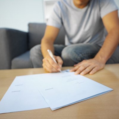 Stockbyte/Stockbyte/Getty Images Funds to purchase property commonly are held in escrow until terms of the sale are met.