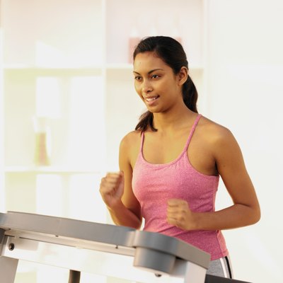 Stockbyte/Stockbyte/Getty Images Treadmills allow you to increase the speed of your walk.