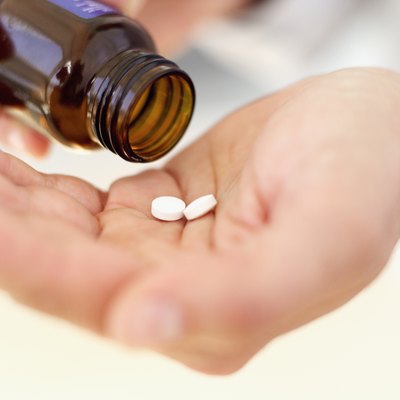 Stockbyte/Stockbyte/Getty Images Take energy pills with caution.
