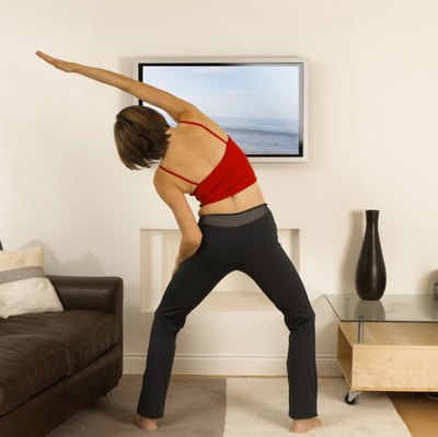 BananaStock/BananaStock/Getty Images New-school fitness videos can help you achieve your workout goals.