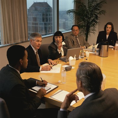 Keith Brofsky/Photodisc/Getty Images Attend to administrative details to ensure successful project meetings.