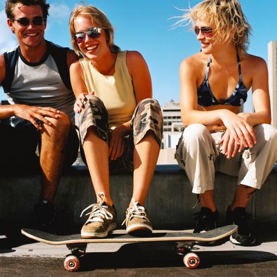 Stockbyte/Stockbyte/Getty Images With the right backpack, your board goes where you go.