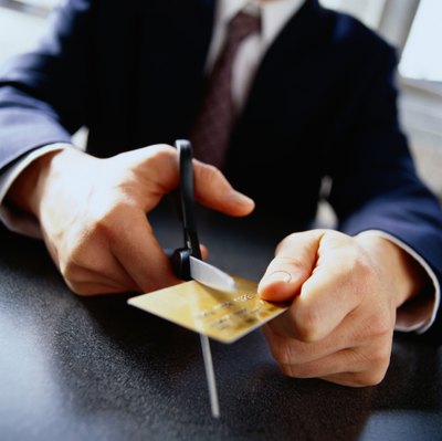 Photodisc/Photodisc/Getty Images Canceling credit cards with high limits is usually a bad move.