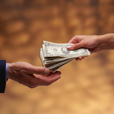 Stockbyte/Stockbyte/Getty Images Most companies provide pay raises once a year.