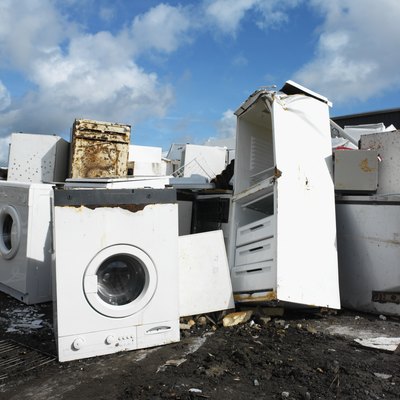 George Doyle/Stockbyte/Getty Images Recycling is preferable to the disposal of large appliances in a landfill.